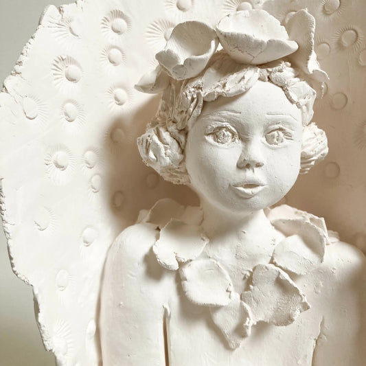 Sculpture Dame à l'oiseau