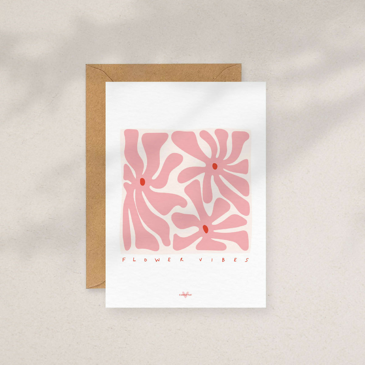 Carte fleurs abstraites rose avec enveloppe kraft assortie.