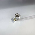 Bague fleur en argent 950 et or 18 carats, motif floral ajouré sur l’anneau
