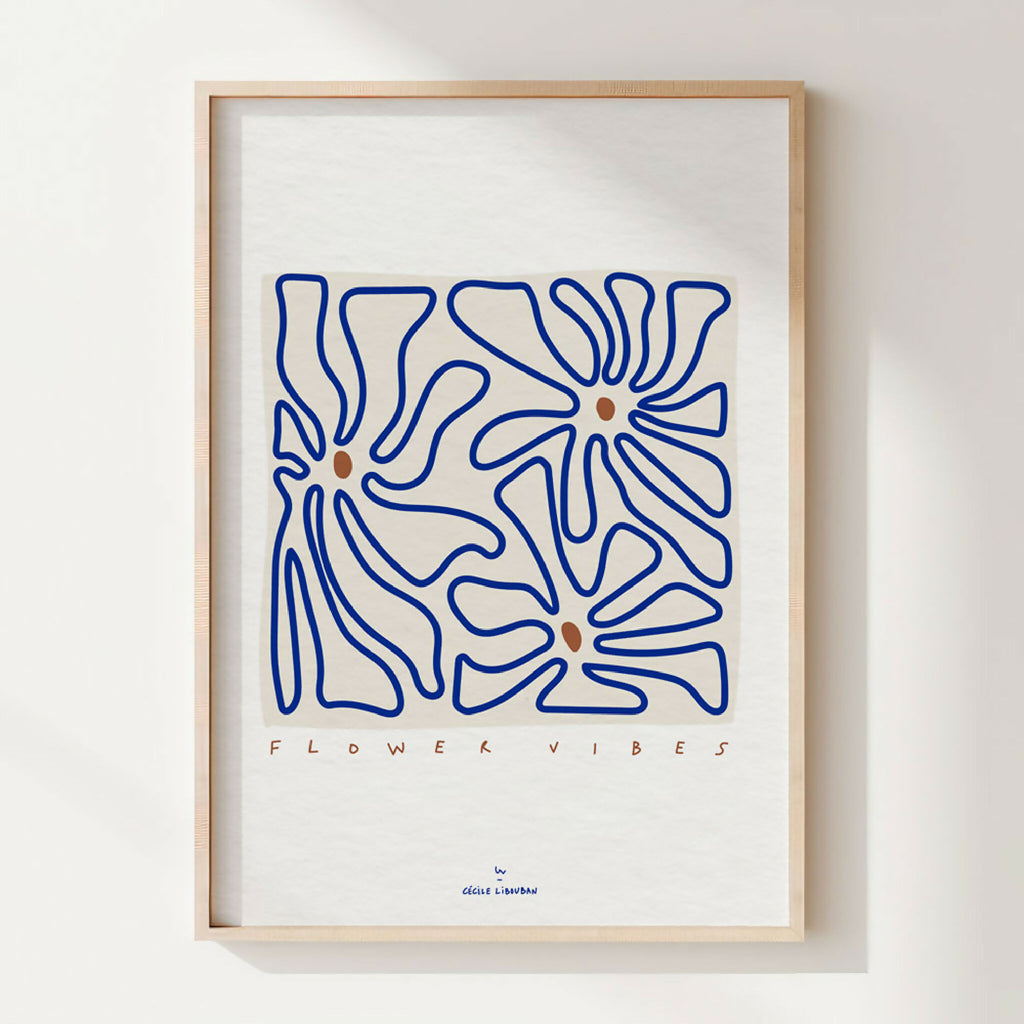 Affiche A4 encadrée : fleurs au trait bleu et texte « FLOWER VIBES »