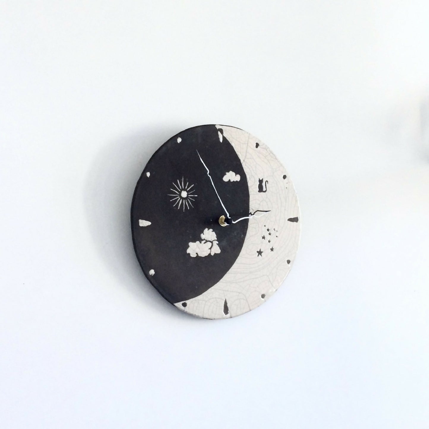 Horloge murale en raku "Jour et Nuit"