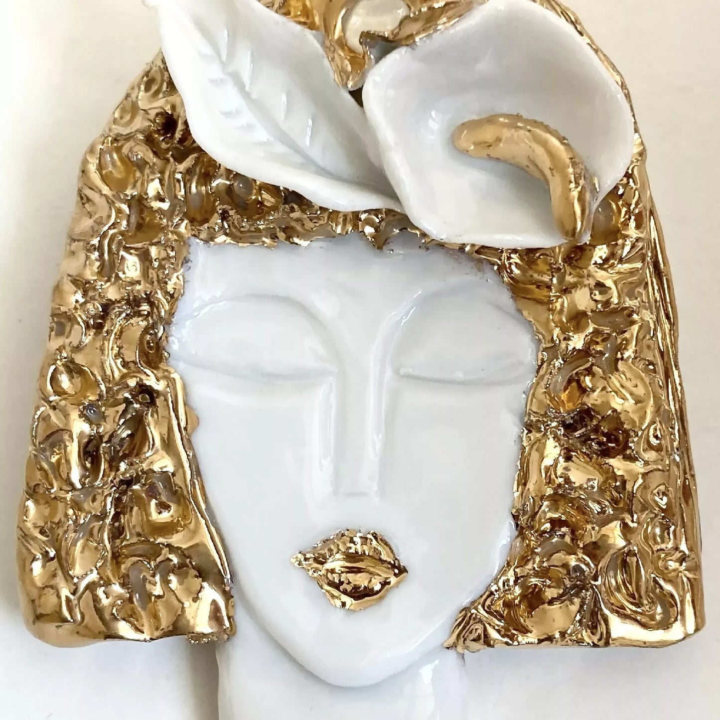 Broche Visage d'or