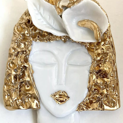 Broche Visage d'or