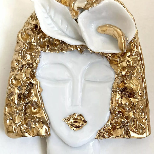 Broche Visage d'or