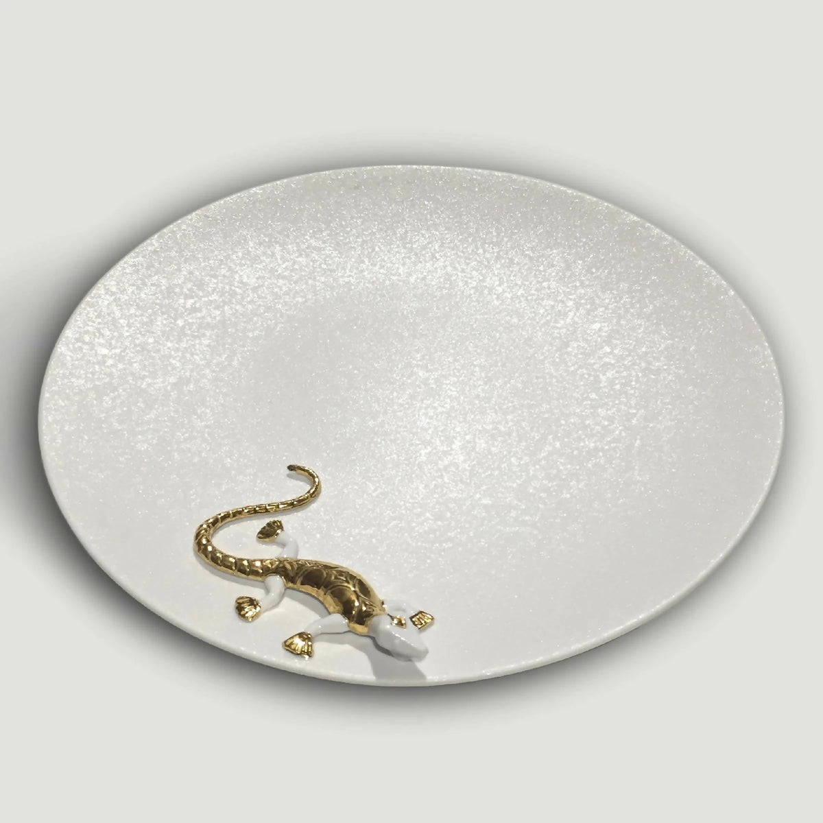 Assiette ovale en porcelaine avec salamandre dorée