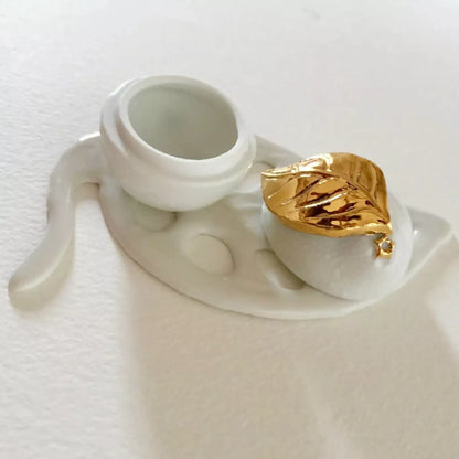 Boite à bijoux citron en porcelaine et or
