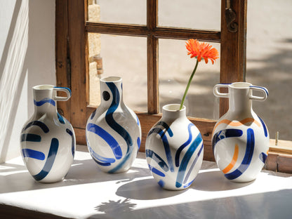 Large vase with bust and handle