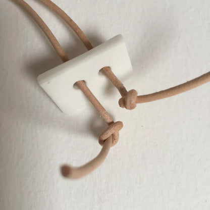 Collier gouttes d'or en porcelaine