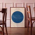 Affiche « Carte céleste » encadrée, cercle bleu au centre sur fond beige.