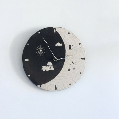 Horloge murale en raku "Jour et Nuit"