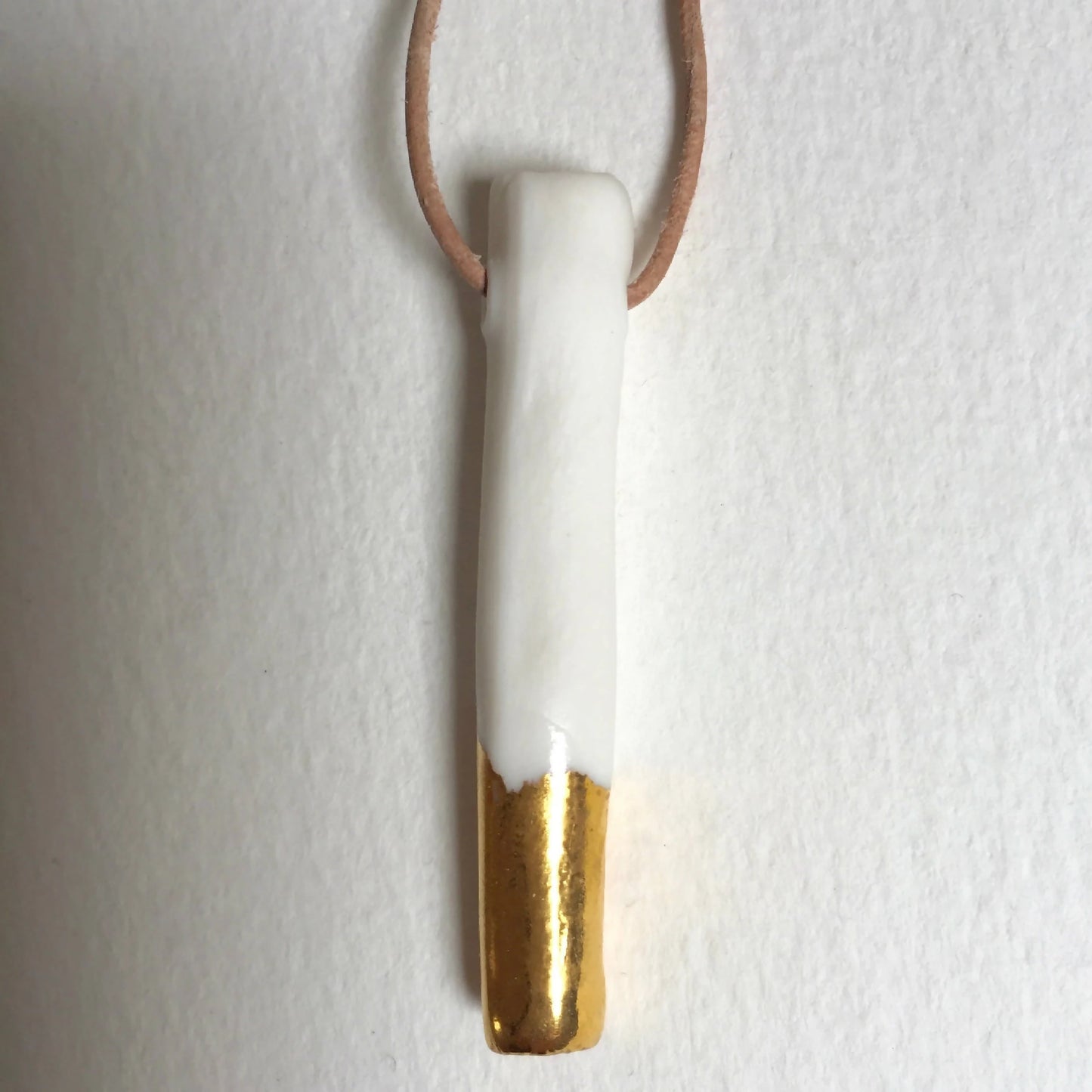 Collier gouttes d'or en porcelaine