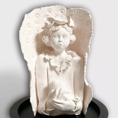Sculpture Dame à l'oiseau