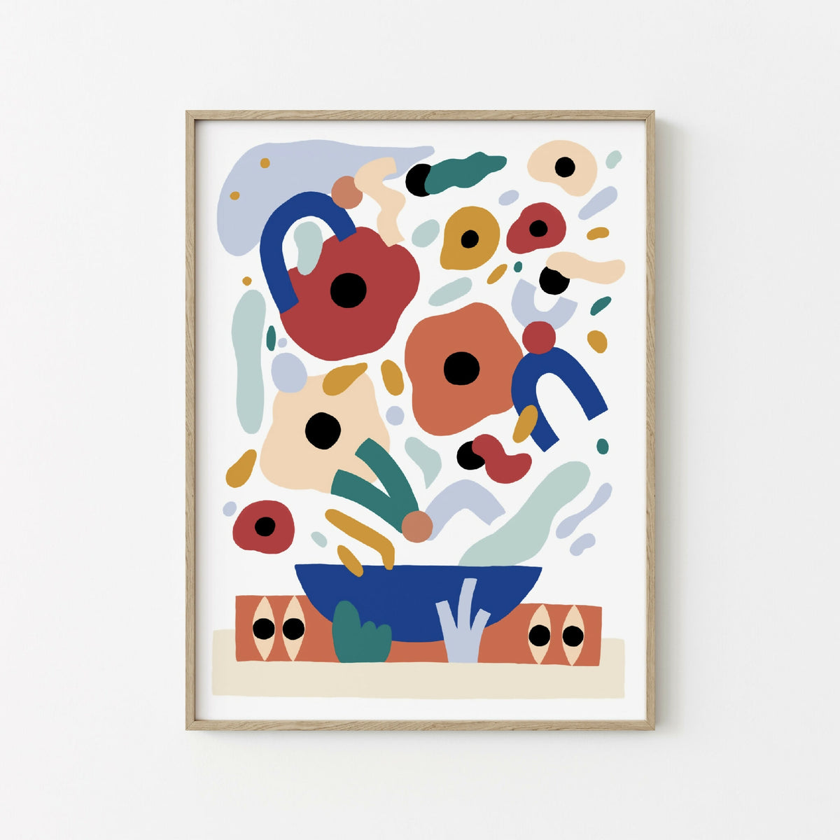 Tableau encadré à fond clair, composition abstraite rouge, bleu, vert et noir