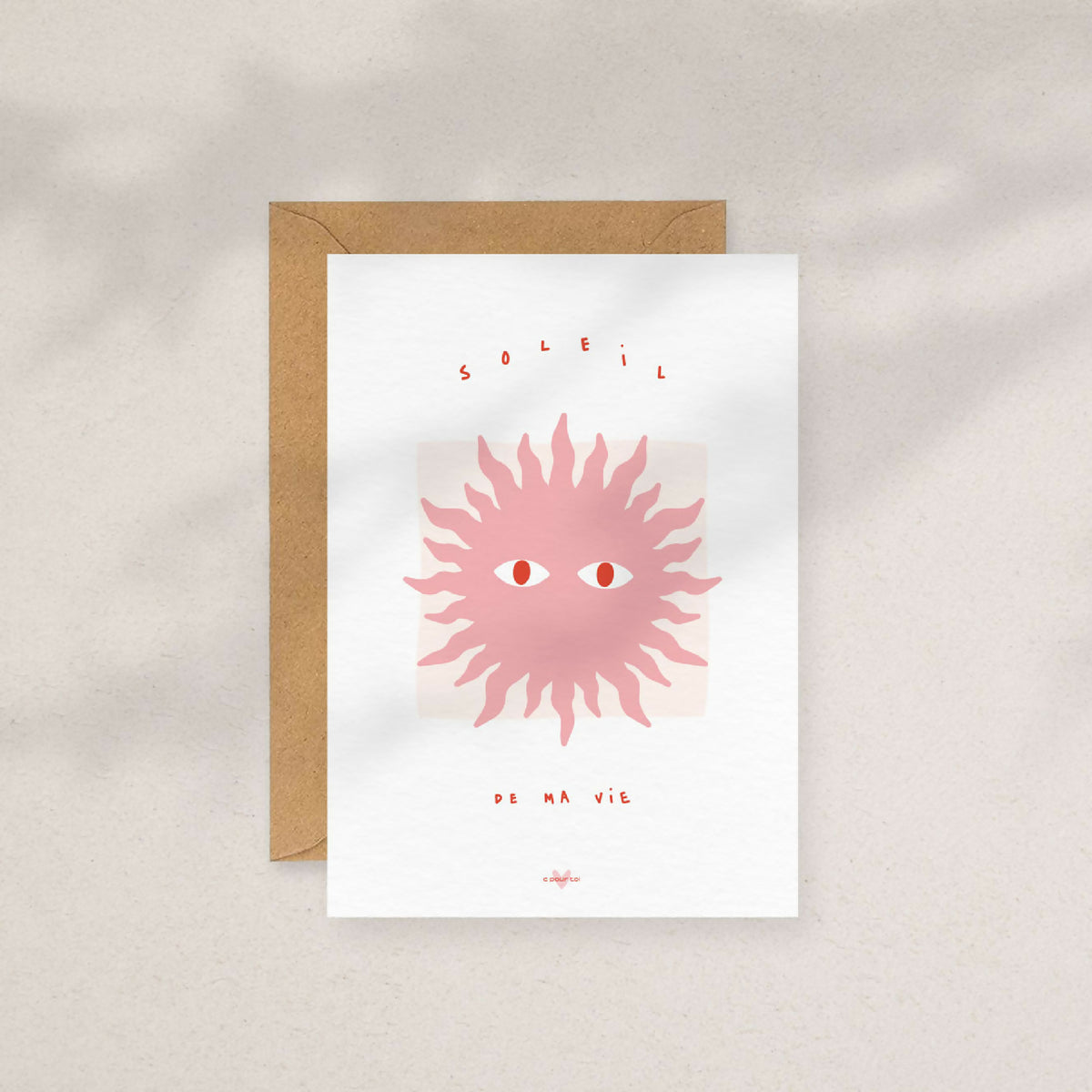 Carte à message blanche avec soleil rose, visages et « de ma vie », enveloppe kraft