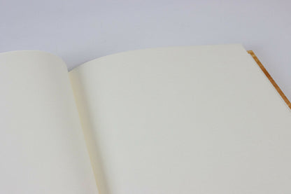 Cahier dos cuir série papiers à la colle