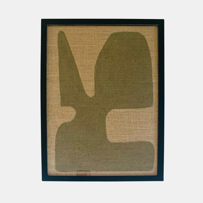 Tableau abstrait encadré, motif vert sur fond beige, cadre noir.