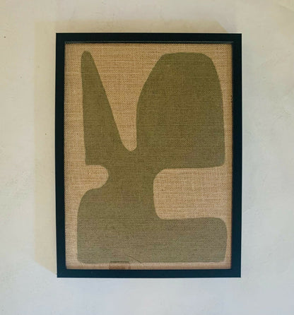 Tableau abstrait encadré, grande forme verte, fond beige, cadre noir.