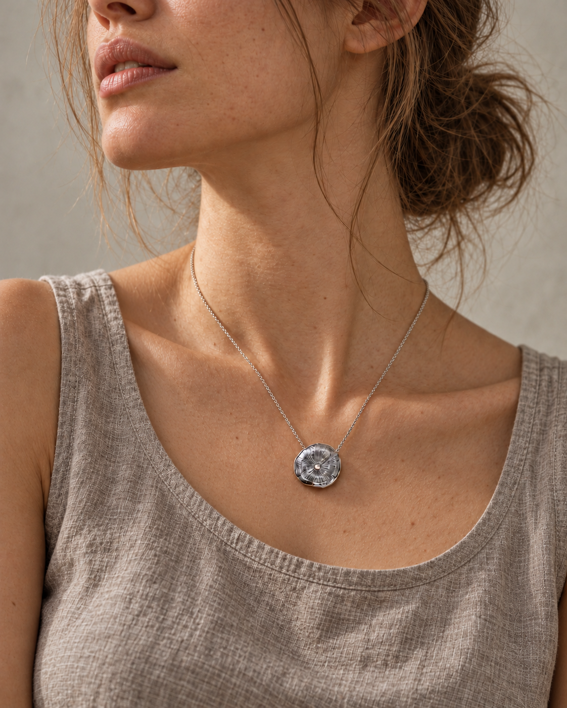 Collier en argent massif, Pendentif inspiré par les rondelles de bois