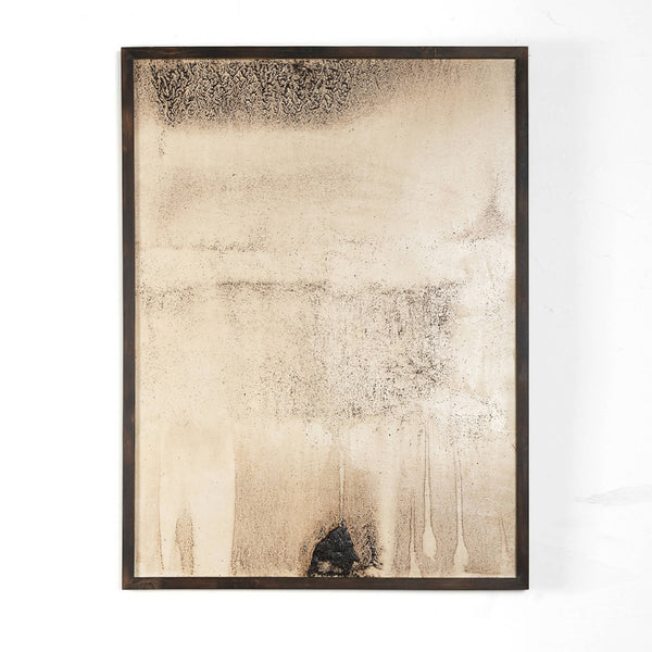Œuvre originale abstraite encadrée, fond beige clair, texture granuleuse et tache sombre en bas.