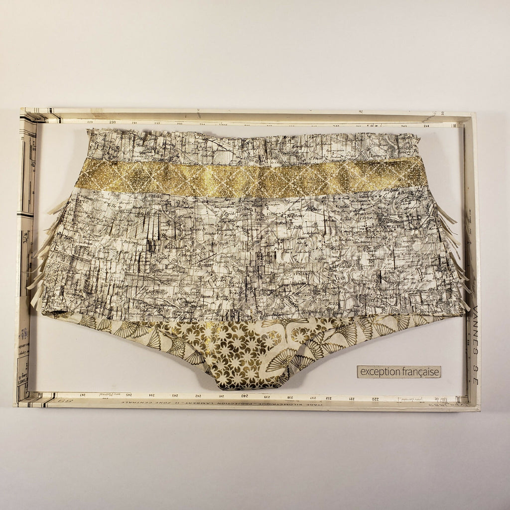 Culotte imprimée gris et doré, taille haute, bords festonnés