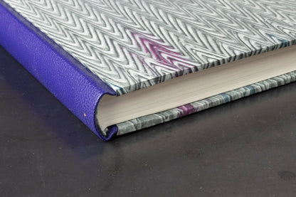 Cahier dos cuir série papiers à la colle