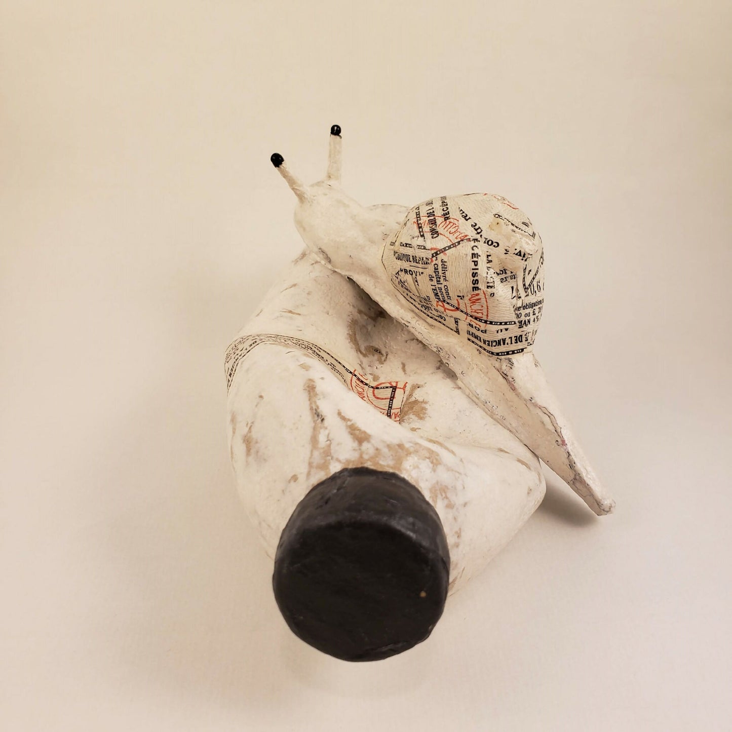 Sculpture - Un escargot blanc