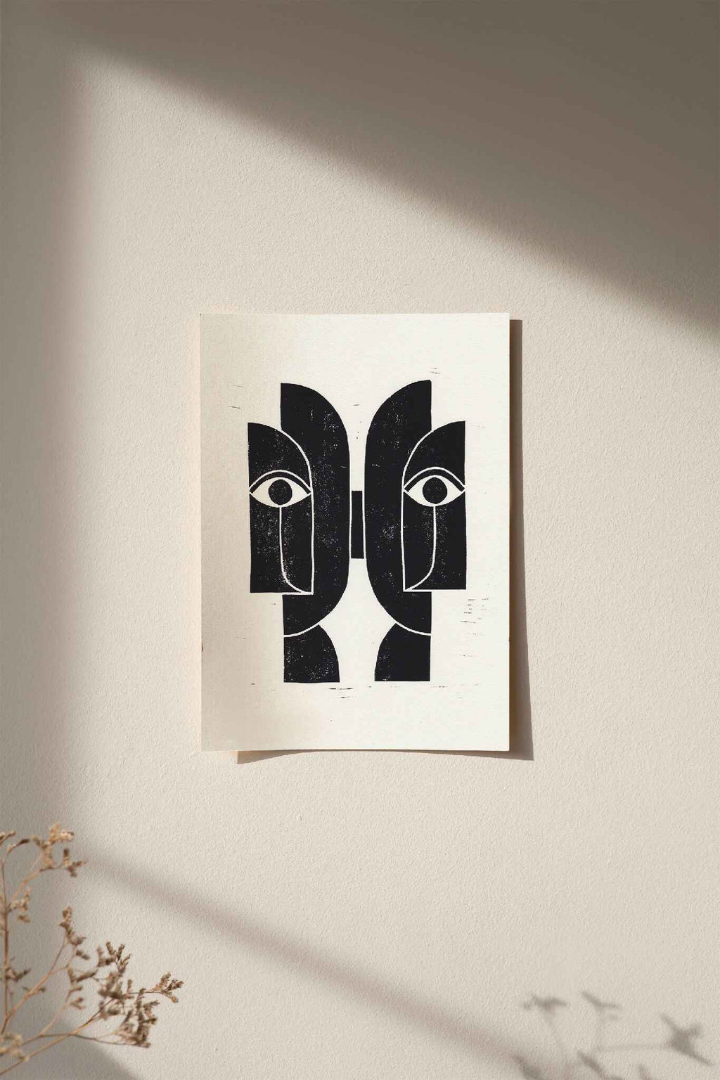 Linogravure encadrée « Sœurs Jumelles » : motifs de visages noir et blanc