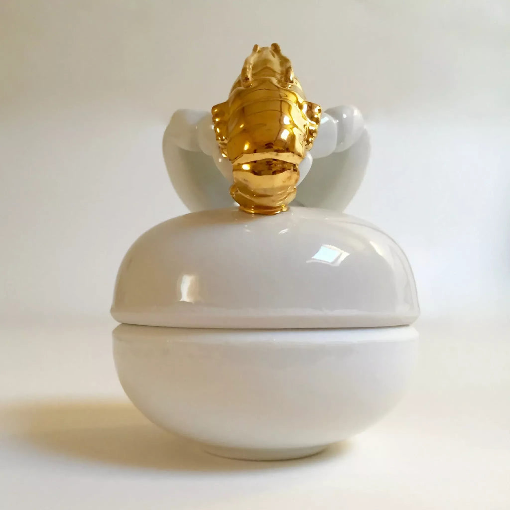 Boîte à bijoux ronde blanche, homard doré sur le dessus