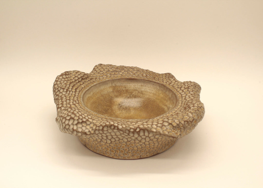 Coupelle double paroi beige à motif piqueté, base légèrement bombée