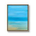 Tableau paysage bleu lagon, cadre en bois clair, teintes bleu et sable.