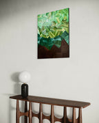 Tableau décoratif vert avec relief de cubes, base brun foncé, cadre noir.