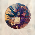 Encre en motif circulaire abstrait multicolore sur fond clair, plume et forme centrale