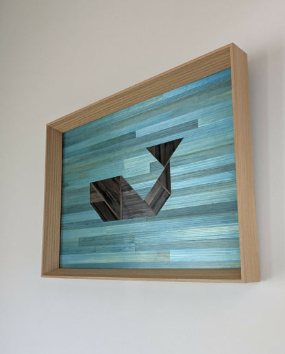Tableau en perspective, marqueterie de paille bleue claire avec formes grises anthracite.