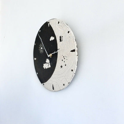 Horloge murale en raku "Jour et Nuit"