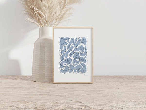 Tirage A4 encadré en bois, illustration abstraite bleue sur fond clair.