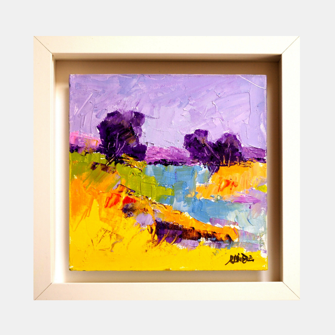 Tableau encadré abstrait : ciel violet, rivière bleue, champs jaunes et orange