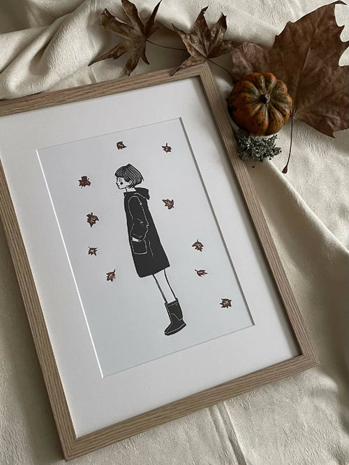 Impression encadrée en chêne : silhouette noire avec étoiles rouges sur fond blanc.