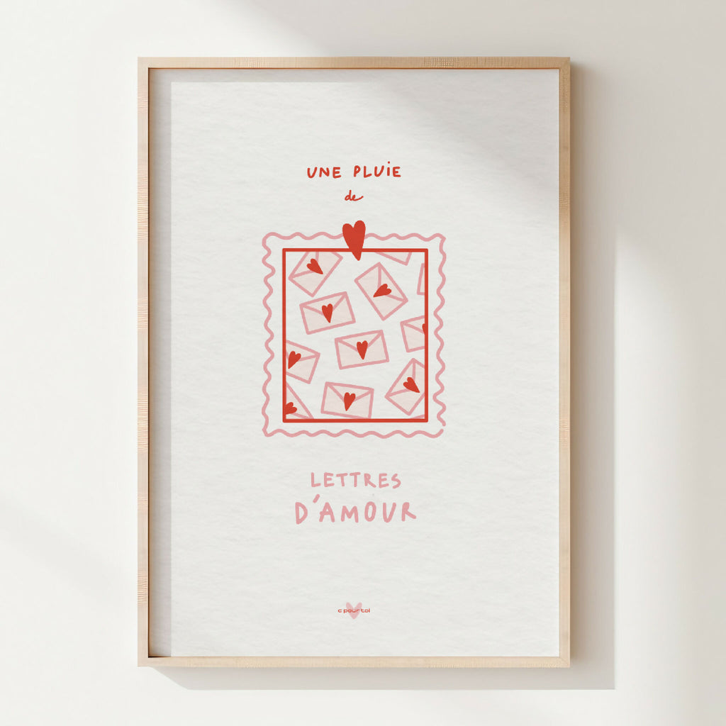 Affiche encadrée avec illustration rouge et texte « Une pluie de lettres d’amour ».