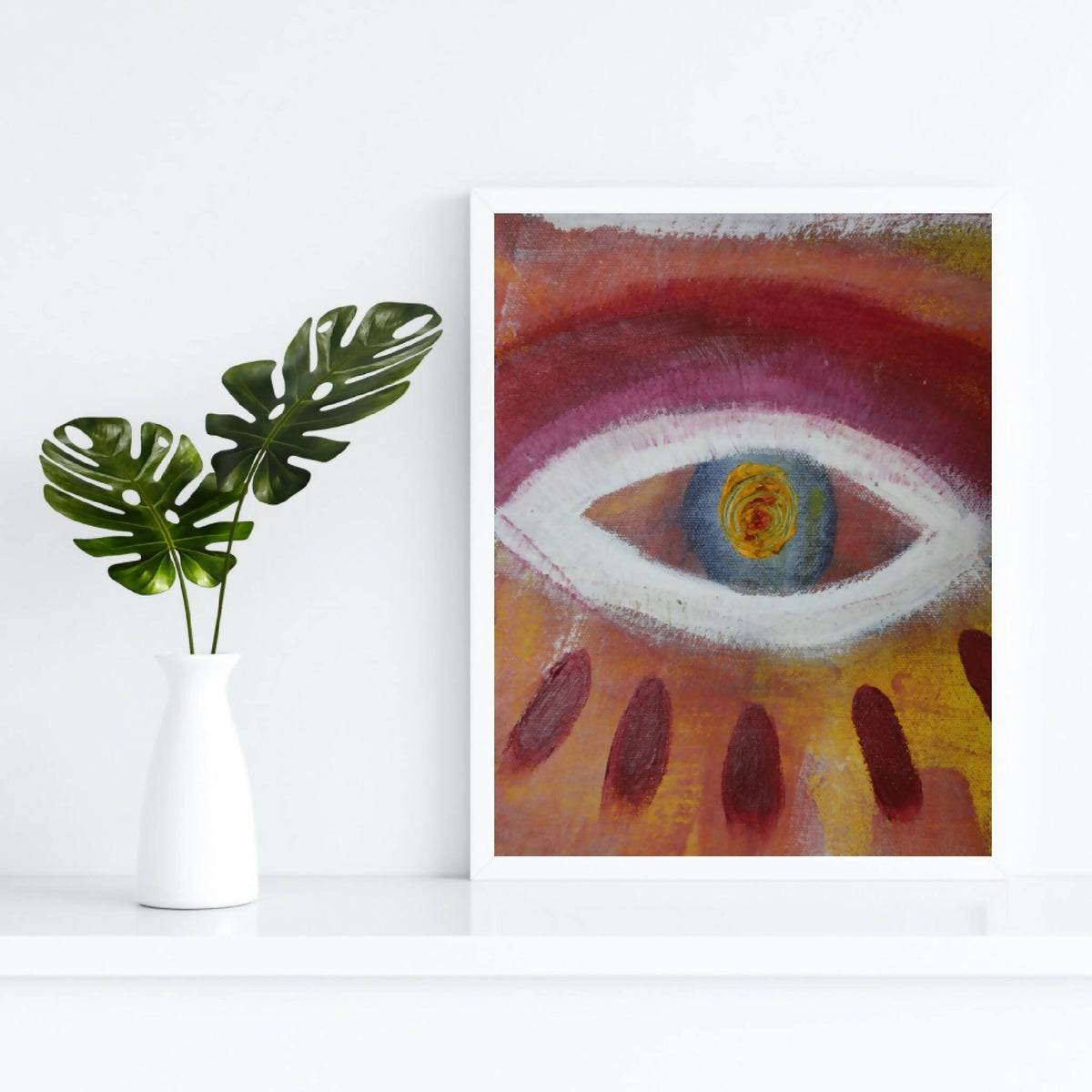 Illustration abstraite encadrée : œil stylisé aux tons rouge et jaune