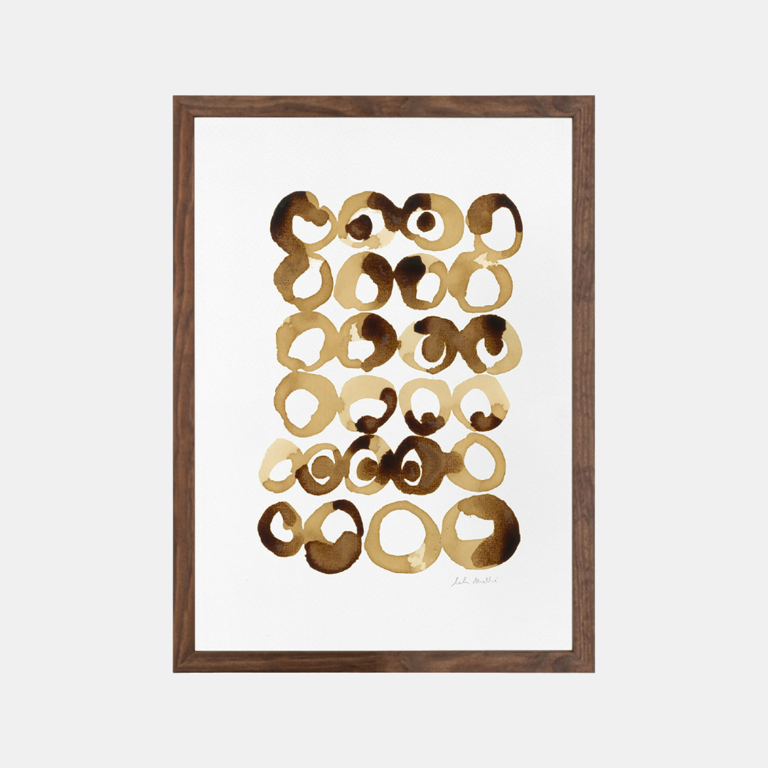 Tableau encadré sur papier coton, motifs abstraits en cercles café.