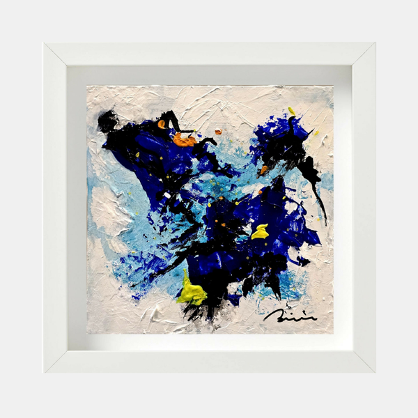 Tableau abstrait encadré Galaxye, touches bleues et jaunes sur fond clair