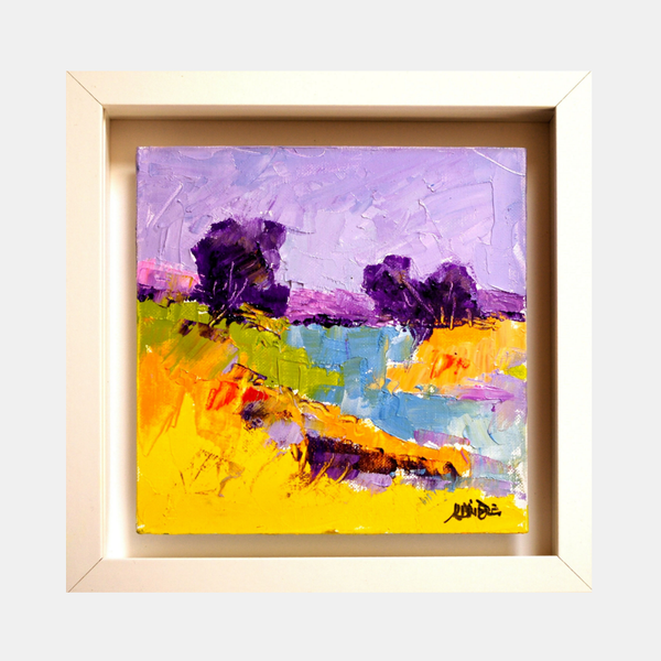 Tableau encadré abstrait : ciel violet, rivière bleue, champs jaunes et orange