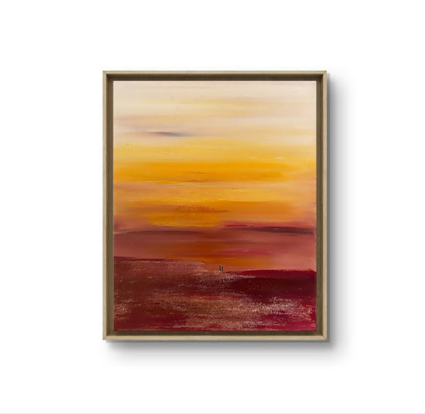 Tableau abstrait coucher de soleil encadré, tons or, orange et bordeaux.