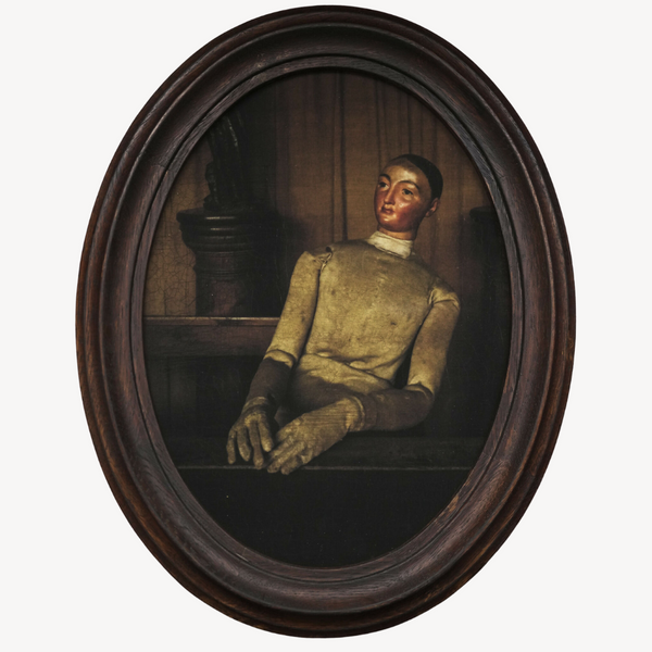 Portrait ancien ovale encadré, homme assis de trois-quarts, regard vers la droite.