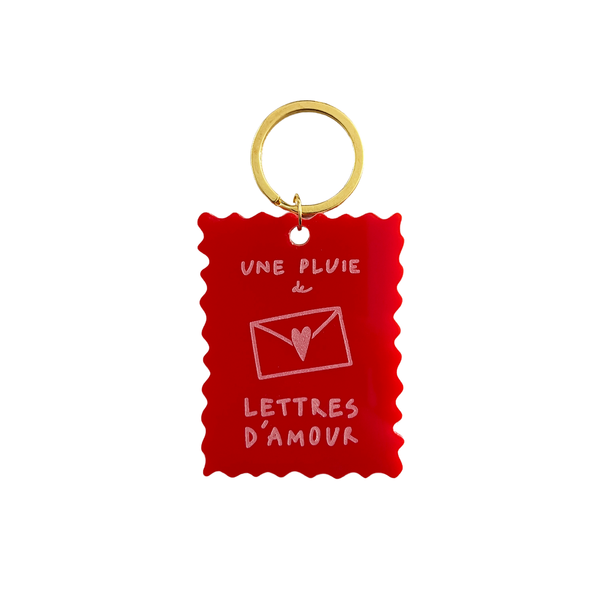 Porte-clés rouge « Une pluie de lettres d’amour » avec anneau doré.