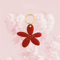 Porte-clés fleur rouge, anneau doré, pétales avec inscription « MA FLEUR »