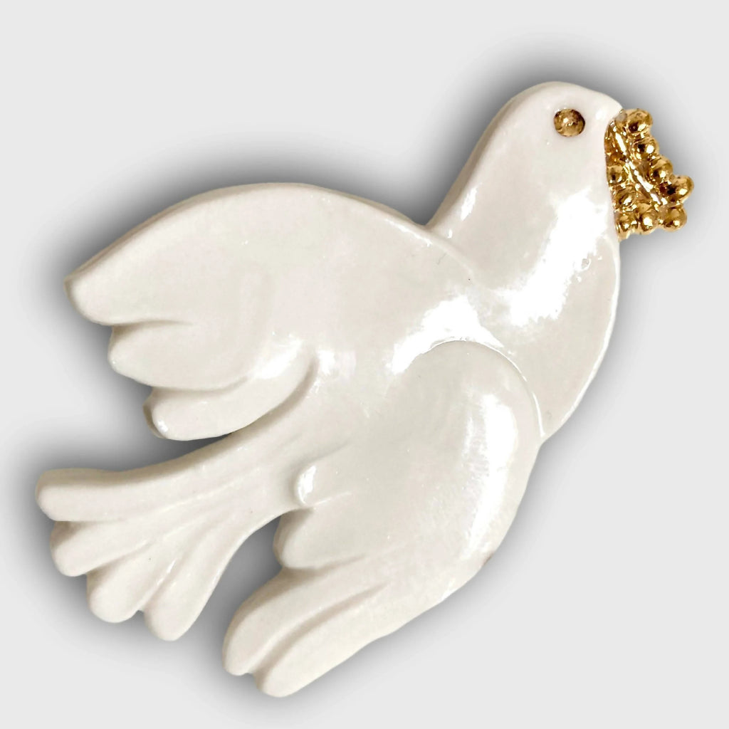 Broche colombe blanche nacrée, aile déployée, fixation dorée