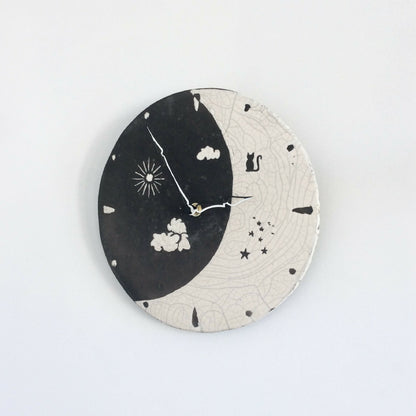Horloge murale en raku "Jour et Nuit"