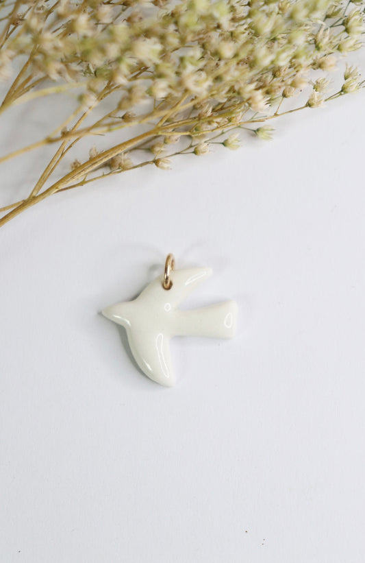 Pendentif breloque oiseau en porcelaine