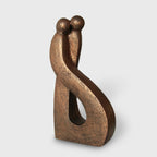 Sculpture abstraite en bronze, deux figures enlacées, forme courbée avec ouverture